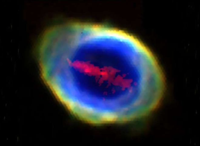 Dies ist ein RGB-Bild des Ringnebels (auch bekannt als M57 oder NGC 6720), zusammengesetzt aus vier WEAVE/LIFU-Emissionslinienbildern. Der helle äußere Ring besteht aus Licht, das von drei verschiedenen Sauerstoffionen emittiert wird, während die mittlere „stabförmige“ Struktur durch Licht entsteht, das von Plasma aus vierfach ionisierten Eisenatomen emittiert wird. Im Bild ist Norden oben und Osten links.