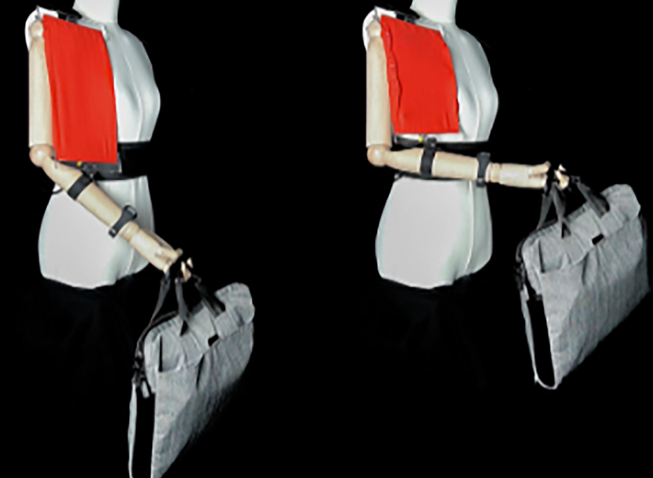 在人体模型的肢体上安装交叉形状记忆合金(SMA)使其能够举起1公斤重的袋子。