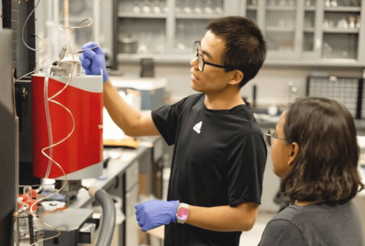 Chuancheng Duan, an associate professor of chemical engineering, measures water uptake thermod