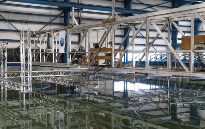 When prototyping a small-scale wave energy converter, the first step is to determine the appropriate 