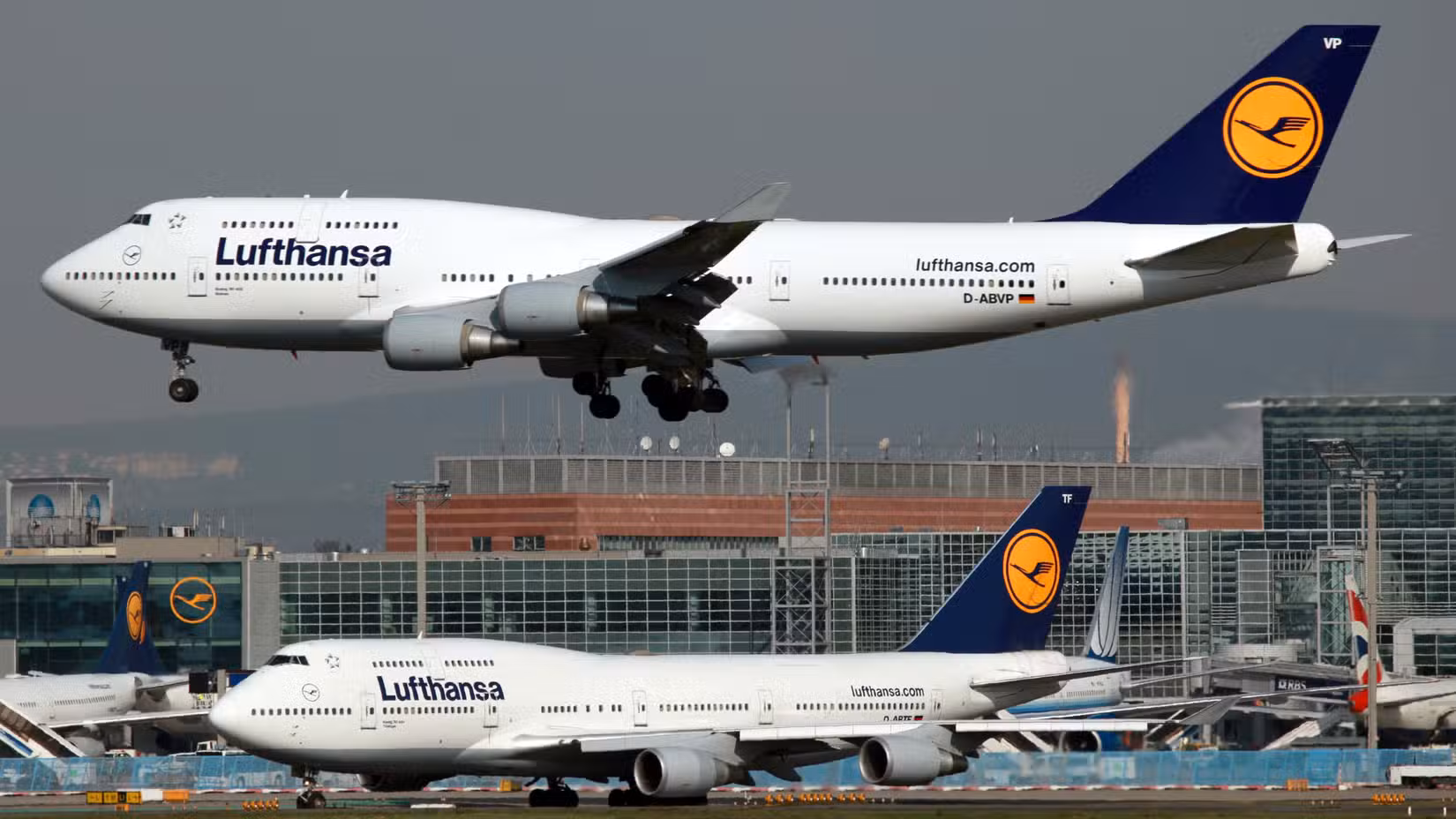 Two Lufthansa Boeing 747-400 at FRA shutterstock_95658298