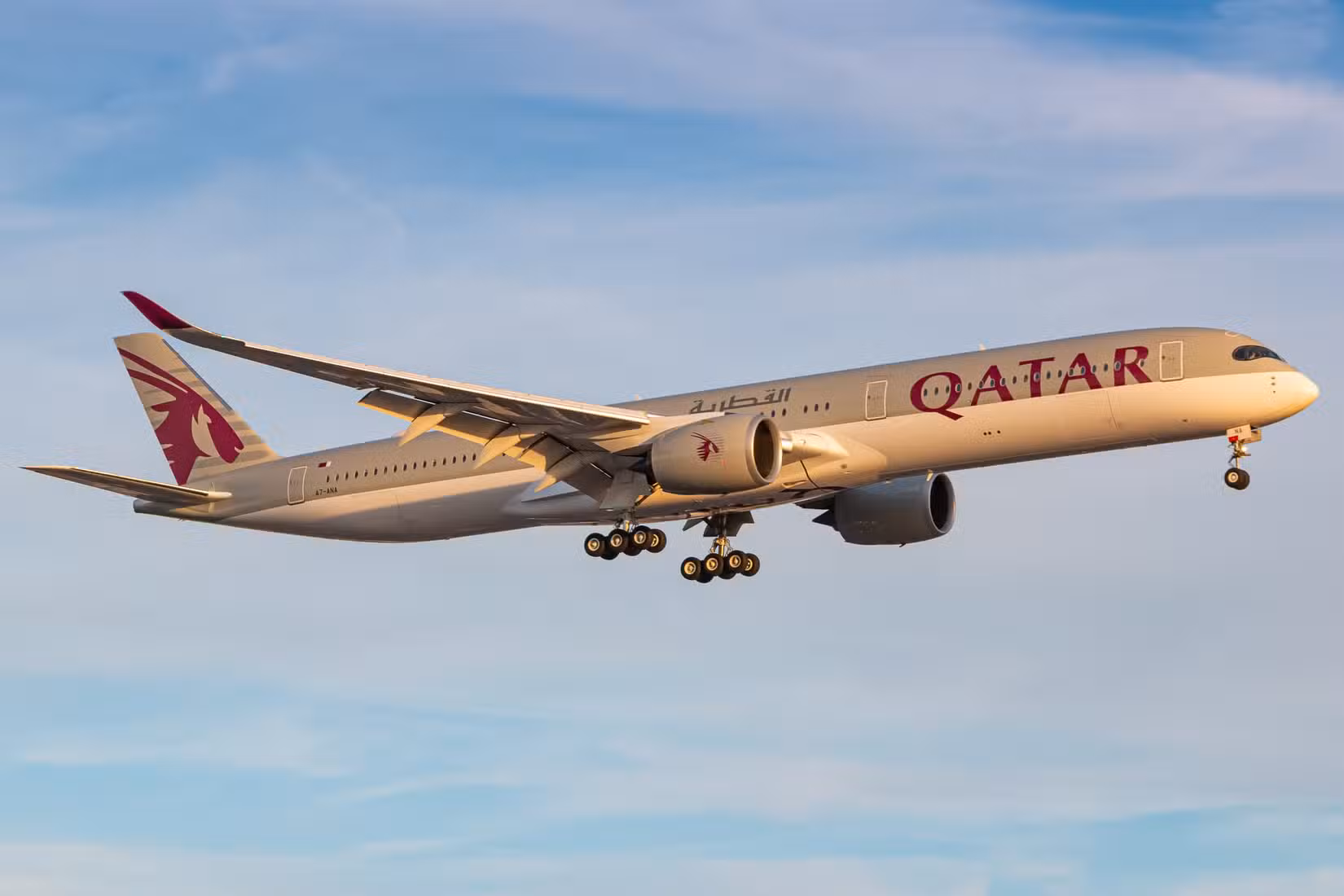 Qatar Airways Airbus A350-1000 landing at London Heathrow Airport LHR shutterstock_1716409885