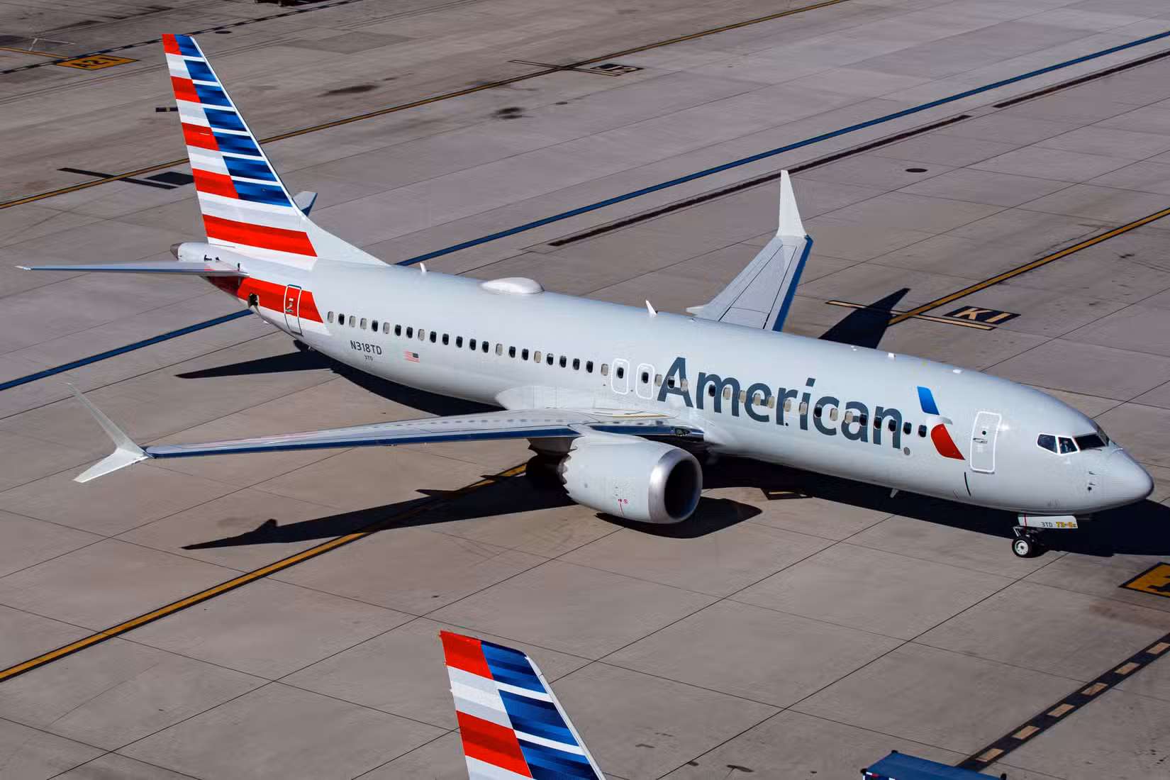 American Airlines passenger plane (Boeing 737-8 MAX  N318TD) taxiing to gate at Phoenix Sky Harbor International Airport (PHX)
