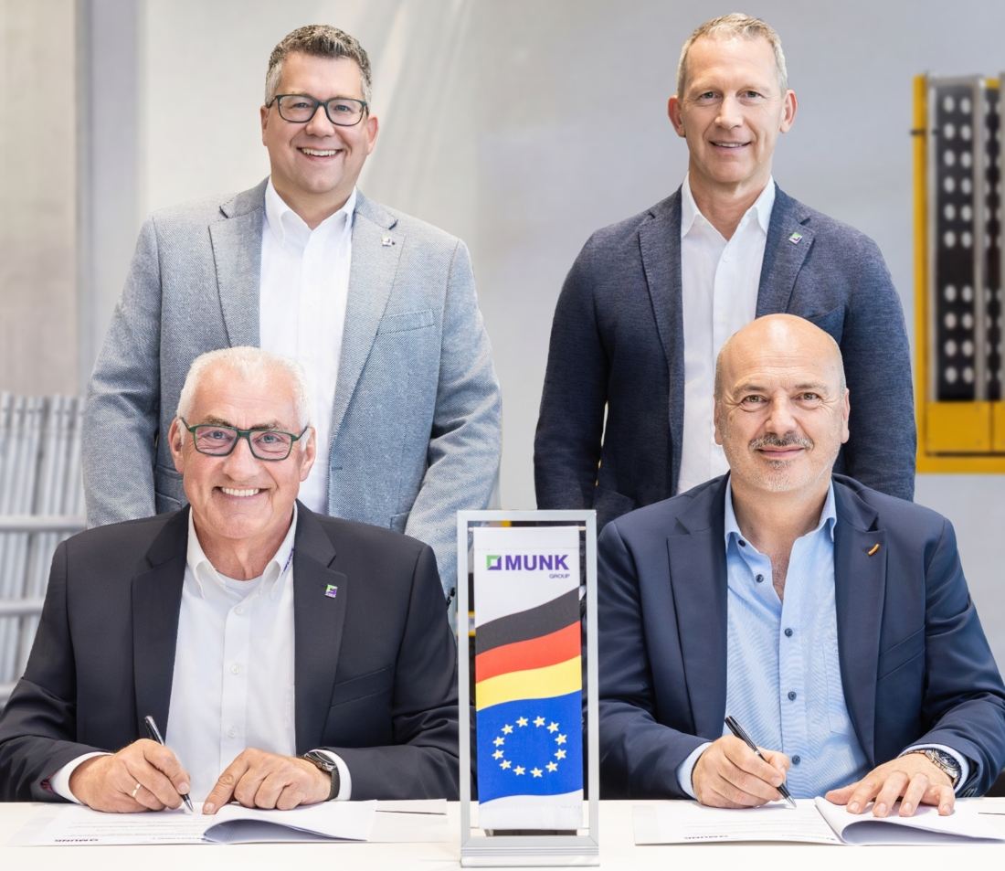 (From left to right) Munk's Ferdinand Munk, Alexander Werdich, and Roland Wilcke with Gromet/Axolift's Massimo Grossele