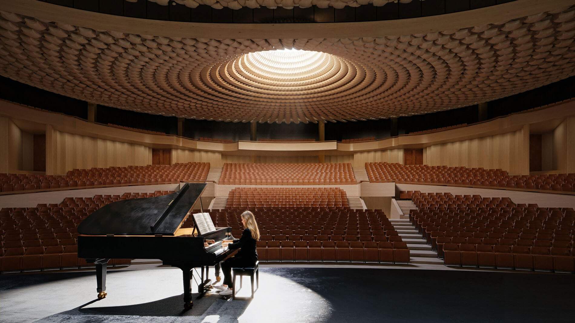 Un piano sur scène, la salle vide