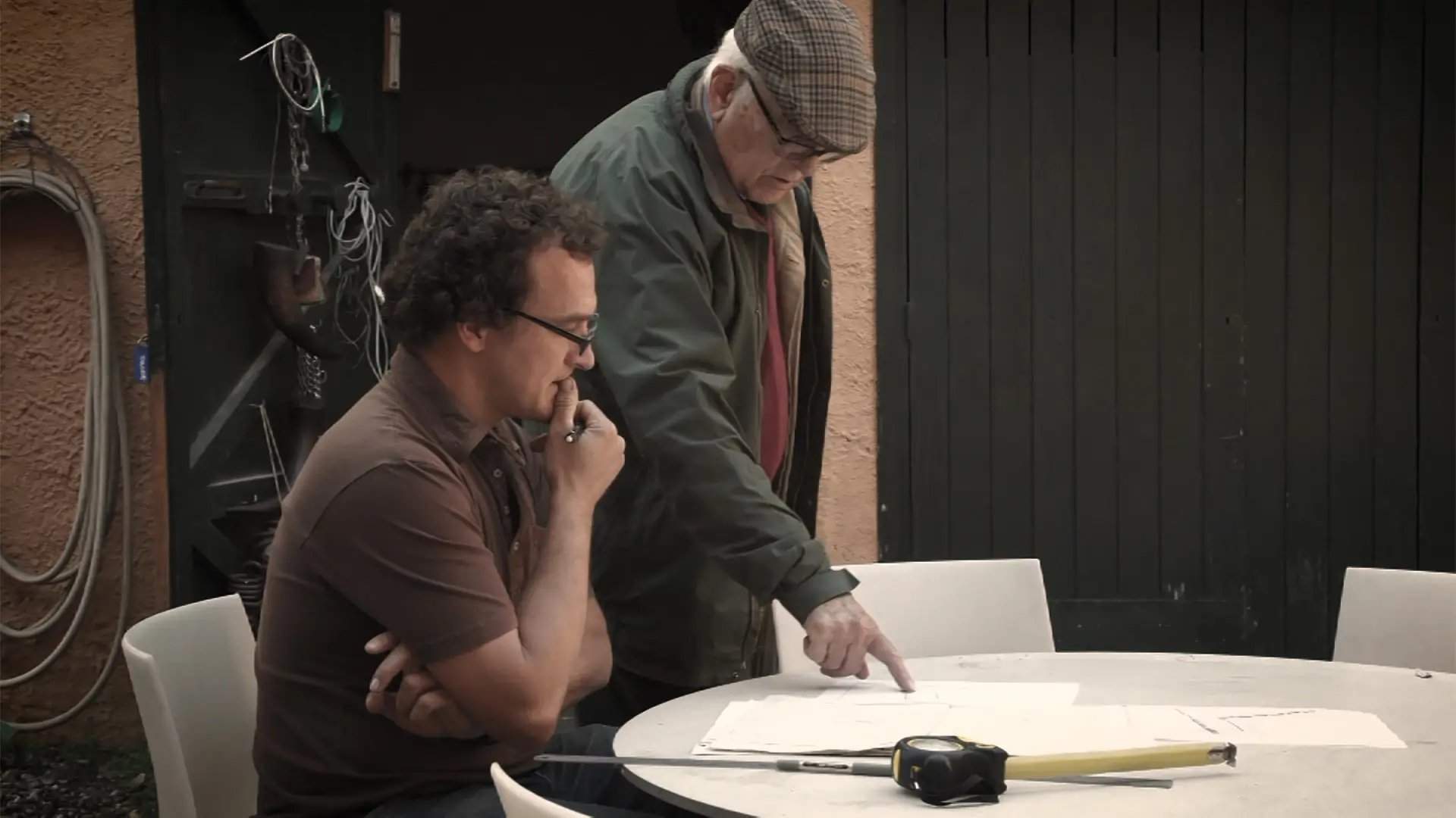 Father and son decide on the final design.