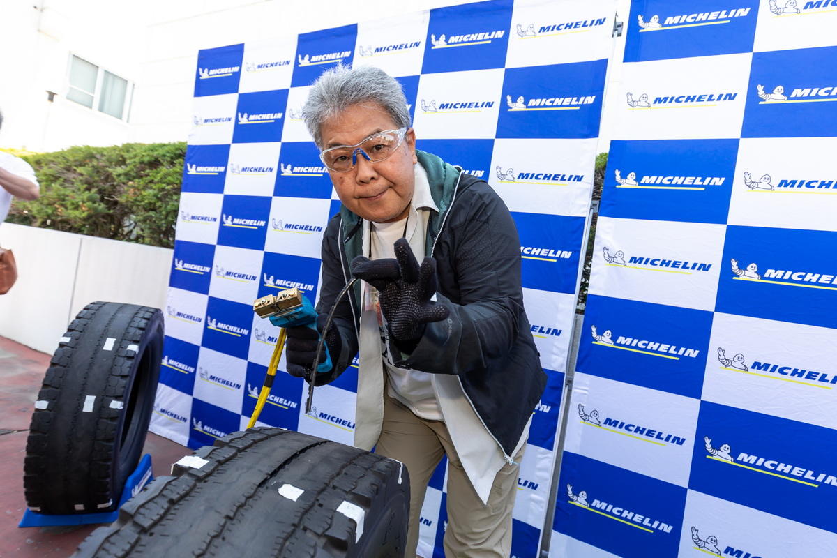 The author is experiencing 'regrooving'—a method of recutting grooves into worn truck tires to extend driving distance.
