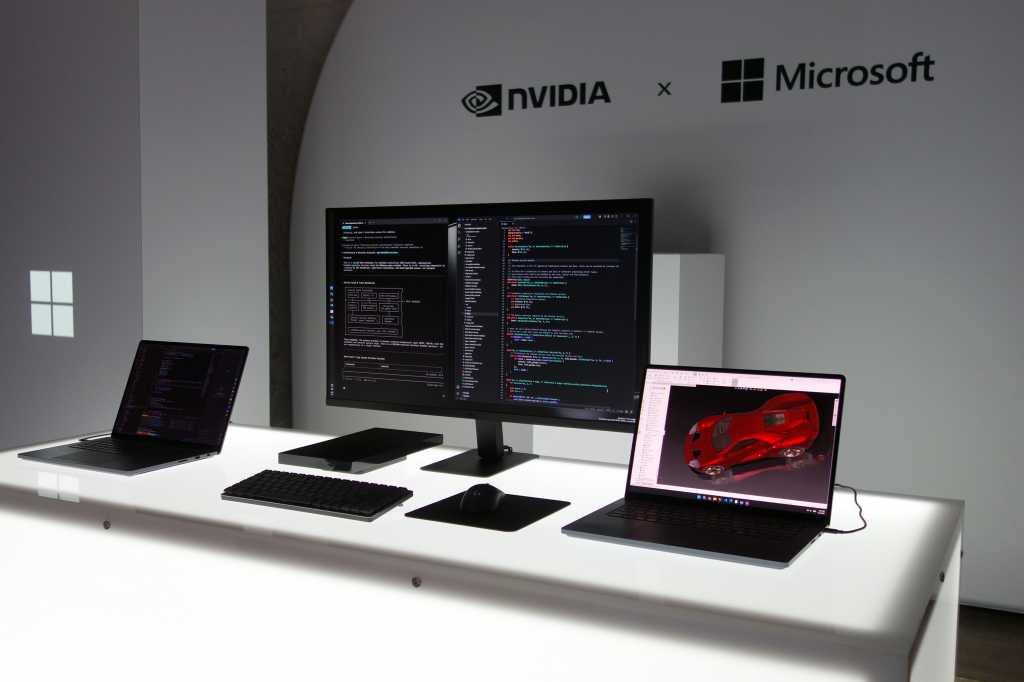 多台 Surface Laptop Ultra 环绕在一台 Surface RTX Spark Dev Box 两侧