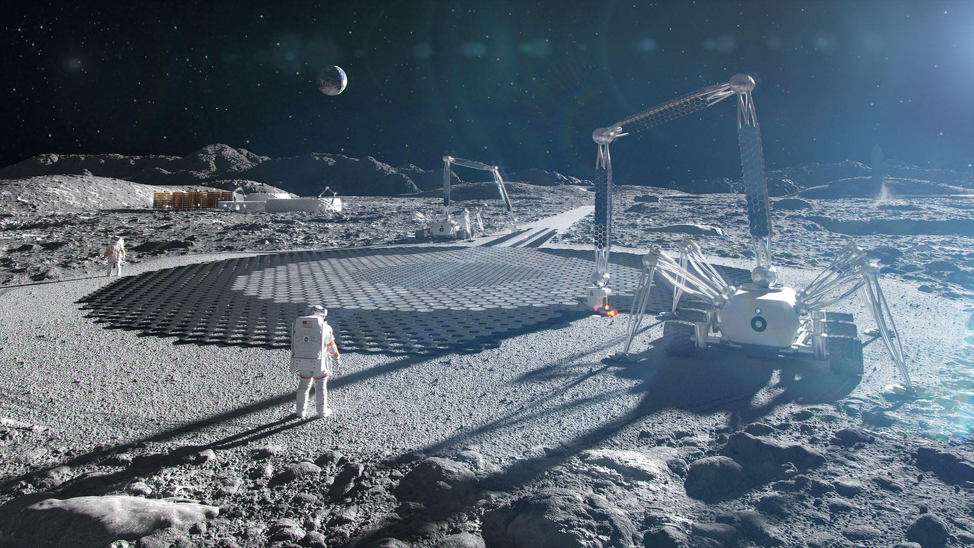 Astronauten und Baugeräte auf dem Mond