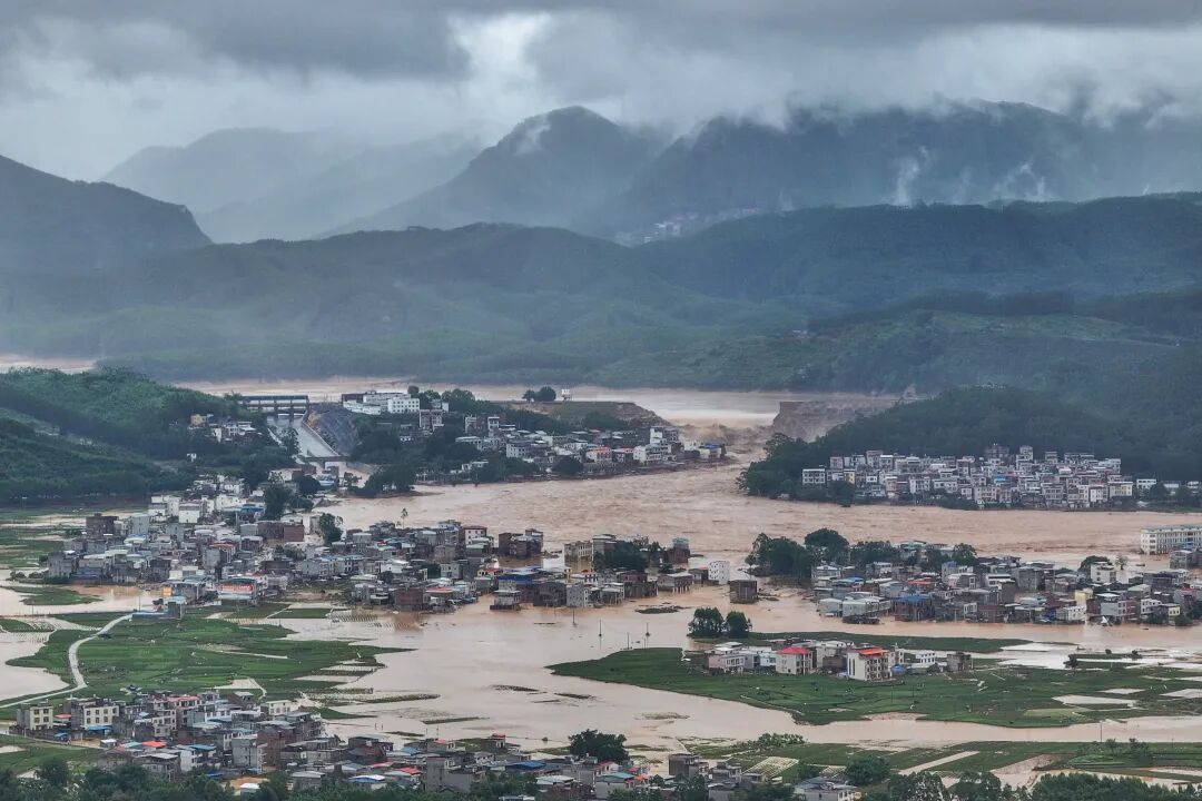 This photo taken on July 6 shows the breach at the Liulan Reservoir in Hengzhou, Nanning, Guangxi (drone photo). Photo by Xinhua reporter Cao Yiming