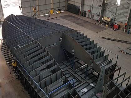 Steel plates being processed in the shipyard