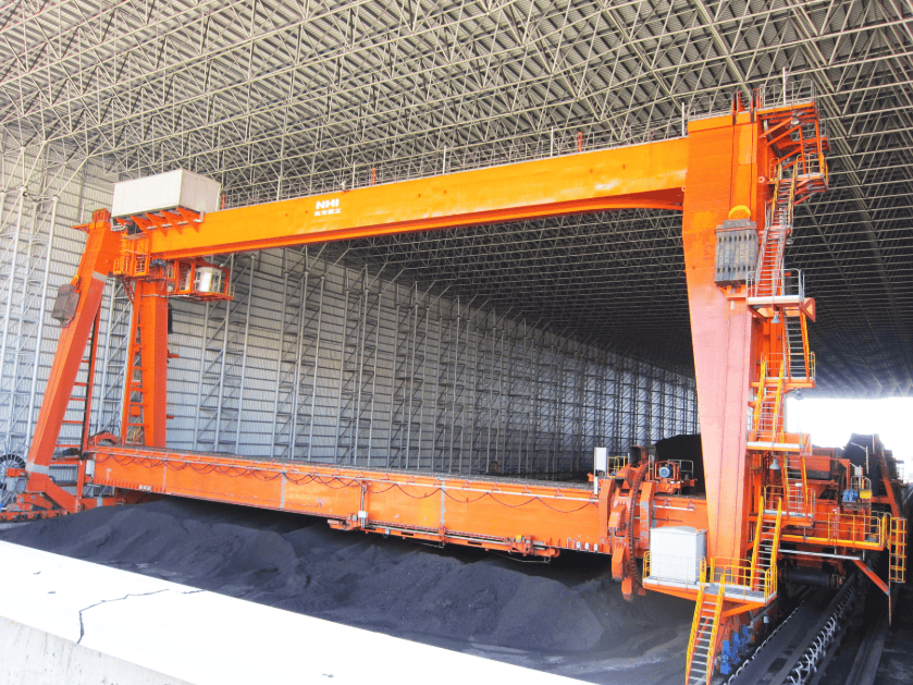 Máquina empilhadeira-retomadora de roda de caçamba tipo pórtico - Northern Heavy Industries